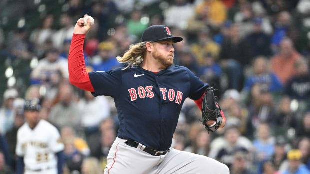 Apr 23, 2023; Milwaukee, Wisconsin, USA; Boston Red Sox relief pitcher Kaleb Ort (61) delivers against the Milwaukee Brewers in the eighth inning at American Family Field. Mandatory Credit: Michael McLoone-USA TODAY Sports